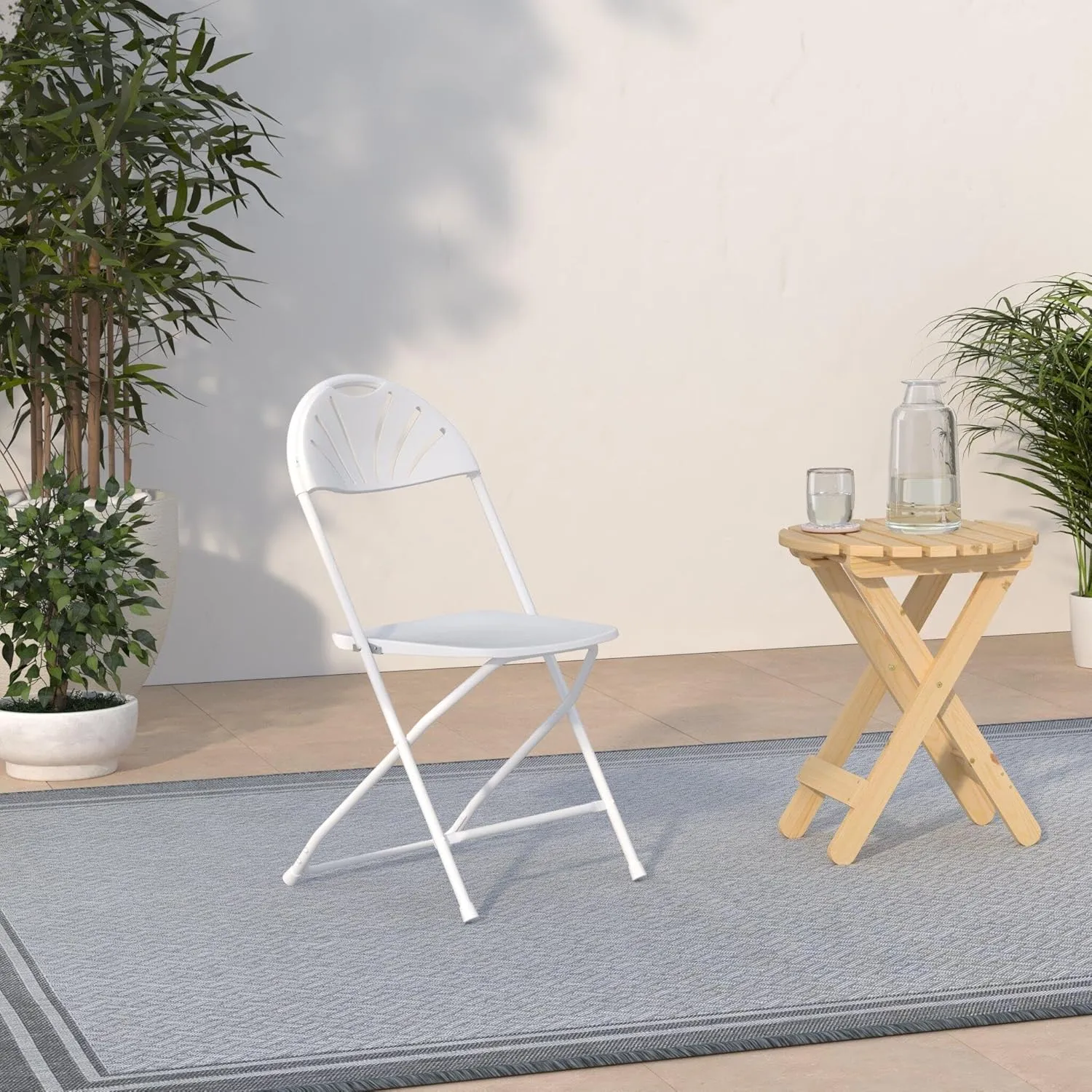 Flash Furniture HERCULES Series 650 lb. Capacity White Plastic Fan Back Folding Chair